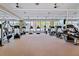 State-of-the-art fitness center with various equipment and large windows at 111 S Pineapple Ave # 1009, Sarasota, FL 34236