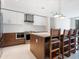 Modern kitchen with stainless steel appliances and an island at 111 S Pineapple Ave # 1009, Sarasota, FL 34236