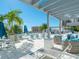 Unwind in the shade with comfortable seating and a refreshing breeze at 111 S Pineapple Ave # 1009, Sarasota, FL 34236