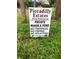 Piccadilly Estates deed restricted community sign, private roads & pond, no trespassing at 225 Brighton Ct, Englewood, FL 34223