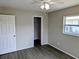 Bright bedroom featuring a ceiling fan and a closet at 5278 Sabrina Ter, North Port, FL 34286