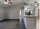 Open floor plan featuring breakfast bar with granite counters and tile flooring at 5278 Sabrina Ter, North Port, FL 34286