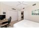 Bedroom with a queen bed, a washer and dryer, and a work station at 553 Bahia Beach Blvd, Ruskin, FL 33570