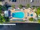 Community pool and hot tub with plenty of lounge chairs at 553 Bahia Beach Blvd, Ruskin, FL 33570