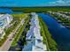 Waterfront community with multiple buildings and lush landscaping at 553 Bahia Beach Blvd, Ruskin, FL 33570