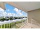 Relaxing balcony hammock with waterfront views of canal and homes at 553 Bahia Beach Blvd, Ruskin, FL 33570
