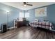 Home office with desk, chair, and plenty of natural light at 12423 23Rd E St, Parrish, FL 34219