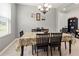 Dining room with table, chairs, and buffet at 12423 23Rd E St, Parrish, FL 34219