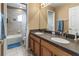 Bathroom with double vanity and shower/tub combo at 12423 23Rd E St, Parrish, FL 34219
