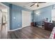 Bedroom with wood floors and ample closet space at 12423 23Rd E St, Parrish, FL 34219