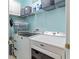 Laundry room with washer, dryer, and storage shelves at 12423 23Rd E St, Parrish, FL 34219