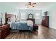 Large bedroom with wood floors, and plenty of natural light at 12423 23Rd E St, Parrish, FL 34219