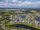 Aerial view showcasing home's location by lake at 12423 23Rd E St, Parrish, FL 34219