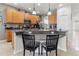 Modern kitchen with ample cabinetry, an island, and stainless steel appliances at 12423 23Rd E St, Parrish, FL 34219