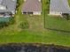 Aerial view showcasing house and yard at 12423 23Rd E St, Parrish, FL 34219