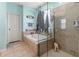 Bathroom features a large garden tub and walk-in shower at 12423 23Rd E St, Parrish, FL 34219