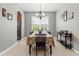Dining room with chandelier and large table at 12423 23Rd E St, Parrish, FL 34219