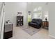 Relaxing living room with black recliner sofa at 12423 23Rd E St, Parrish, FL 34219