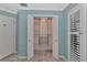 Well-organized closet with wire shelving and ample storage space at 225 Brighton Ct, Englewood, FL 34223