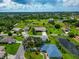 Aerial view showing home's location and neighborhood at 225 Brighton Ct, Englewood, FL 34223