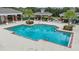 Community pool area with plenty of lounge chairs at 12344 Whisper Lake Dr, Bradenton, FL 34211