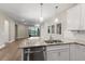 Kitchen with granite countertops and stainless steel dishwasher at 6927 Dorset Ct, Bradenton, FL 34202