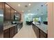 Modern kitchen with stainless steel appliances and granite countertops at 6622 Devesta Loop, Palmetto, FL 34221