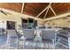Community indoor bar with seating and wood accents at 18114 Gawthrop Dr # 403, Bradenton, FL 34211