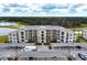 Modern apartment building with covered parking and landscaping at 18114 Gawthrop Dr # 403, Bradenton, FL 34211