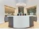 Reception desk with wine storage and modern decor at 18114 Gawthrop Dr # 403, Bradenton, FL 34211