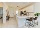 Modern kitchen with white cabinets and quartz counters at 18114 Gawthrop Dr # 403, Bradenton, FL 34211