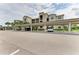Covered parking area for residents with building view at 18114 Gawthrop Dr # 403, Bradenton, FL 34211