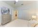 Well-lit bedroom with a queen bed and built-in closet at 18114 Gawthrop Dr # 403, Bradenton, FL 34211