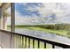 Relaxing balcony with stunning views of a lush golf course at 18114 Gawthrop Dr # 403, Bradenton, FL 34211