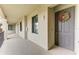 Private hallway entrance with modern fixtures at 18114 Gawthrop Dr # 403, Bradenton, FL 34211