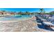 Expansive pool deck with plenty of lounge chairs at 18114 Gawthrop Dr # 403, Bradenton, FL 34211