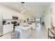 Modern kitchen with an island and open floor plan at 18114 Gawthrop Dr # 403, Bradenton, FL 34211