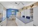 Kitchen features white cabinets, a breakfast nook, and an island at 7157 Del Lago Dr, Sarasota, FL 34238