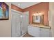 Bathroom with granite vanity and walk-in shower at 7157 Del Lago Dr, Sarasota, FL 34238