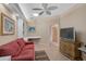 Spacious office with built-in shelving and view to hallway at 7157 Del Lago Dr, Sarasota, FL 34238