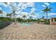 Relaxing pool area with lounge chairs and umbrellas at 7157 Del Lago Dr, Sarasota, FL 34238