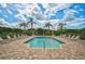 Community pool with plenty of lounge chairs at 7157 Del Lago Dr, Sarasota, FL 34238