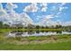 Stunning lake view of a tranquil community at 7157 Del Lago Dr, Sarasota, FL 34238