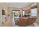 Relaxing living room with leather furniture and access to patio at 7157 Del Lago Dr, Sarasota, FL 34238
