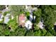 Aerial view of property and surrounding area showing a house with a car in the driveway at 1820 7Th E Ave, Bradenton, FL 34208