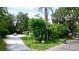 Ranch home with a large front yard and mature trees at 1820 7Th E Ave, Bradenton, FL 34208