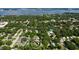 Wide aerial view showcasing property location near water, highlighting neighborhood context at 1820 7Th E Ave, Bradenton, FL 34208