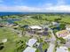 Aerial view of community amenities including golf course and clubhouse at 1602 Fairway Trce # 1602, Palmetto, FL 34221