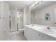 Bathroom boasts a double vanity, shower, and updated fixtures at 1602 Fairway Trce # 1602, Palmetto, FL 34221