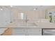 Kitchen island with double sink and modern faucet at 1717 Bonita Bluff Ct, Ruskin, FL 33570